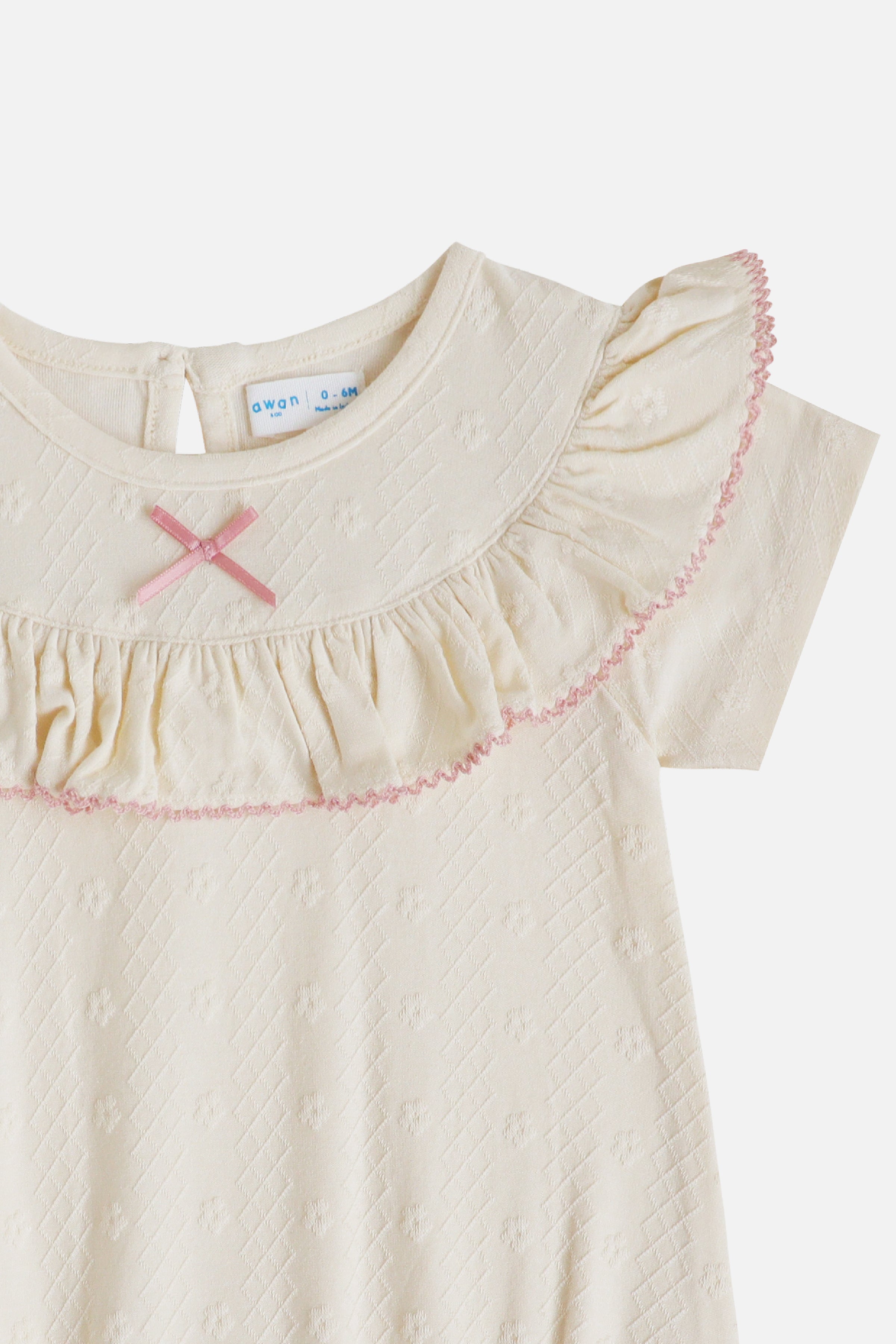 KindKnit Millie Onesie in Buttercream