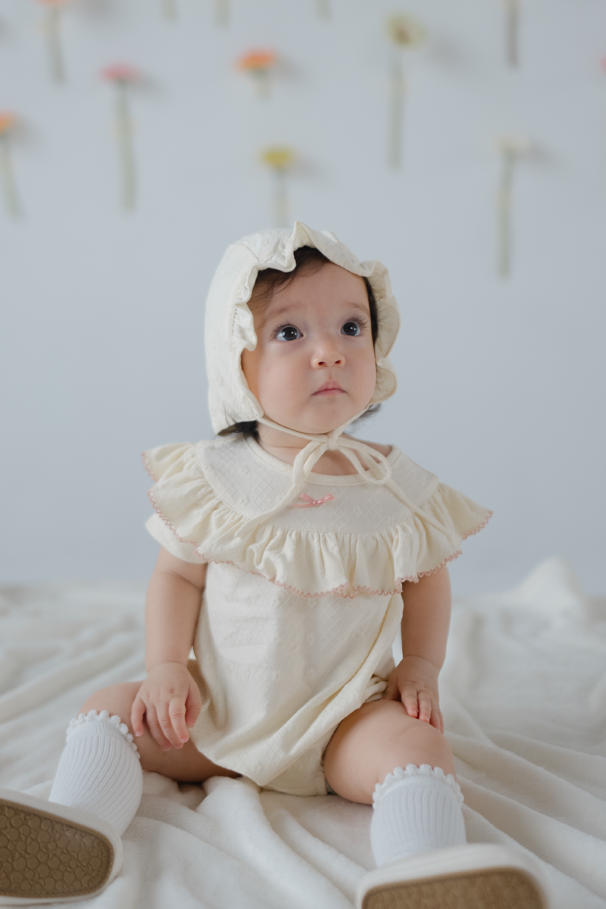 KindKnit Millie Onesie in Buttercream